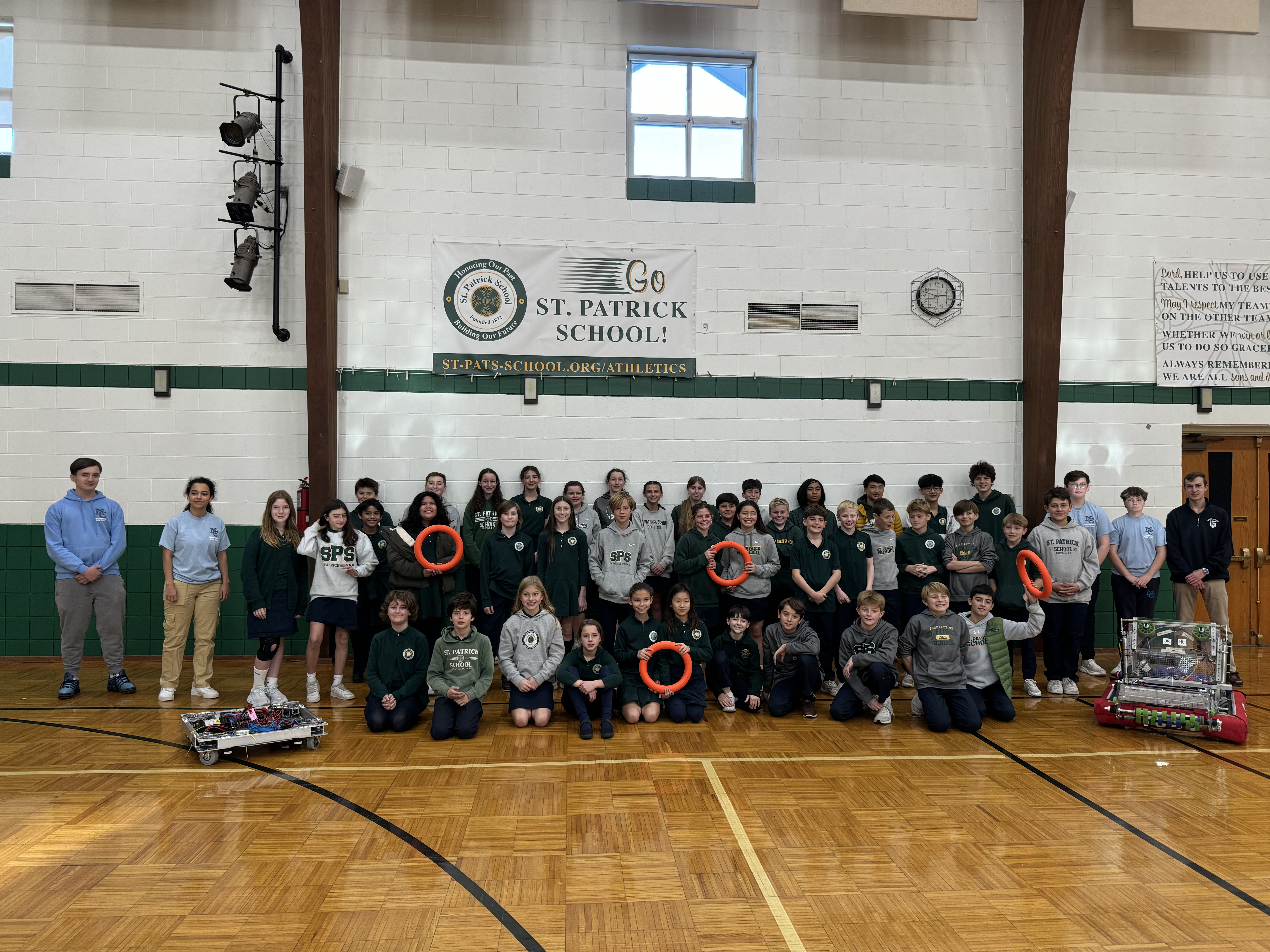 FRC 7045 Students demonstrating robots at St. Patrick School